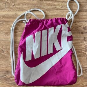 Nike Magenta Drawstring Backpack with White Swoosh